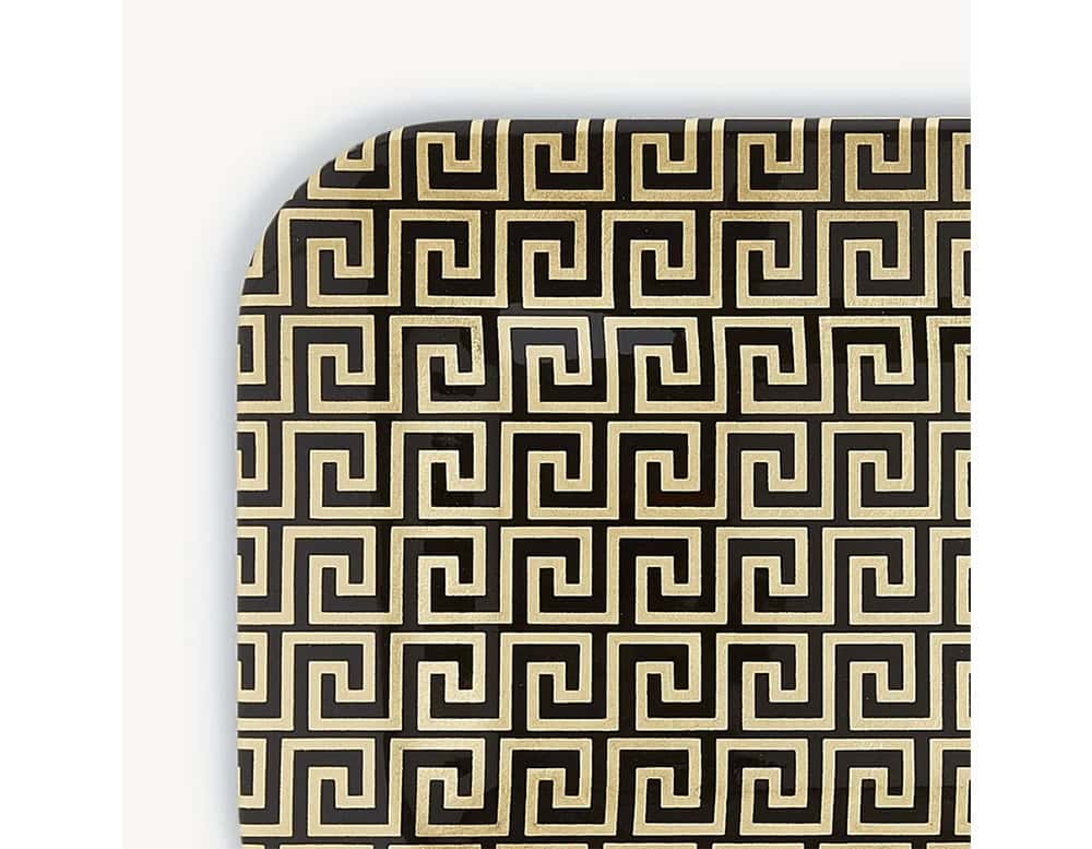 Striking black tray adorned with a repeating gold motif, offering a refined decorative touch perfect for serving or display.
