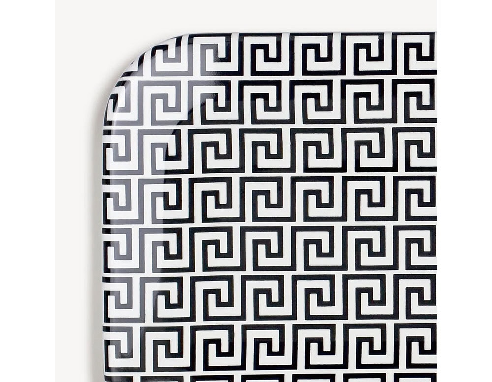 Stylish tray with a classic black and white maze-like pattern, offering a sleek and modern accent for serving or showcasing items.