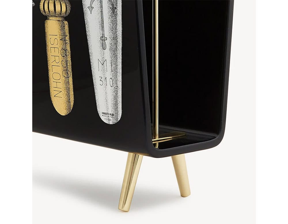 This sculptural magazine rack combines playful illustration and luxurious detailing, turning everyday storage into a striking design statement.