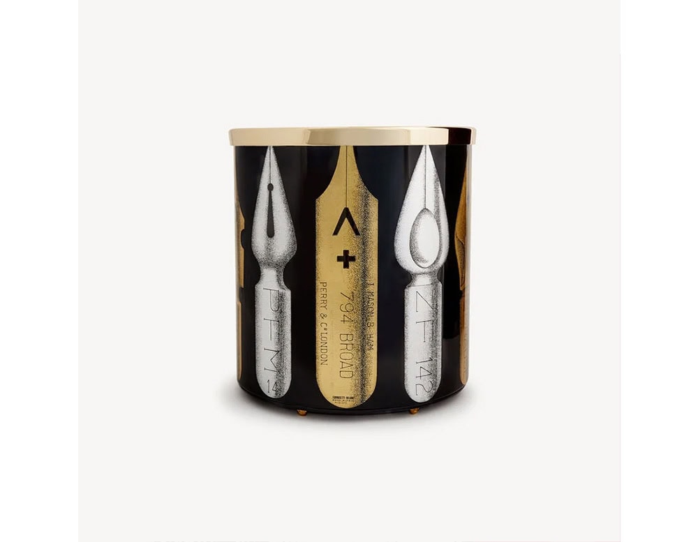 This elegant wastebasket showcases Fornasetti’s iconic pen nib artwork, combining playful Italian design with everyday functionality.