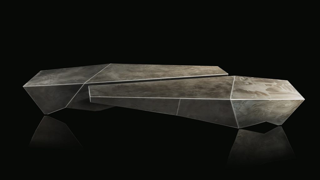 tables made of stone with internal metal structure covered with stone in a black tone on a black background