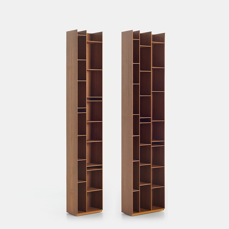 teo bookcases with several shelves and plants made of Canaletto walnut wood in a brown tone on a white background