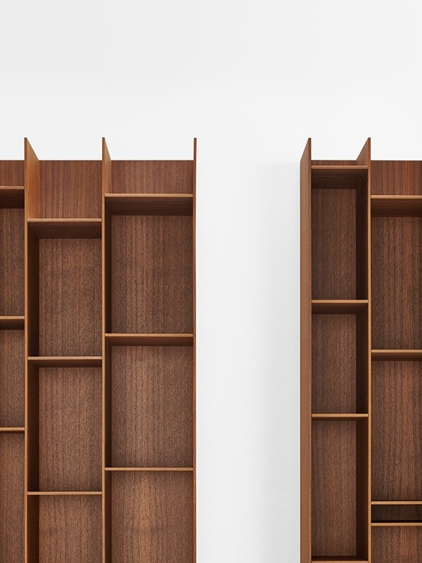 two bookcases with several shelves of different sizes and spaces made of Canaletto walnut wood in a brown tone