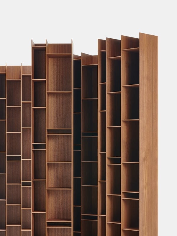 line of bookcases with several shelves of different sizes and spaces made of Canaletto walnut wood in a brown tone