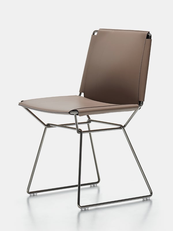 chair made of steel finished in black chrome and leather seat in a brown tone