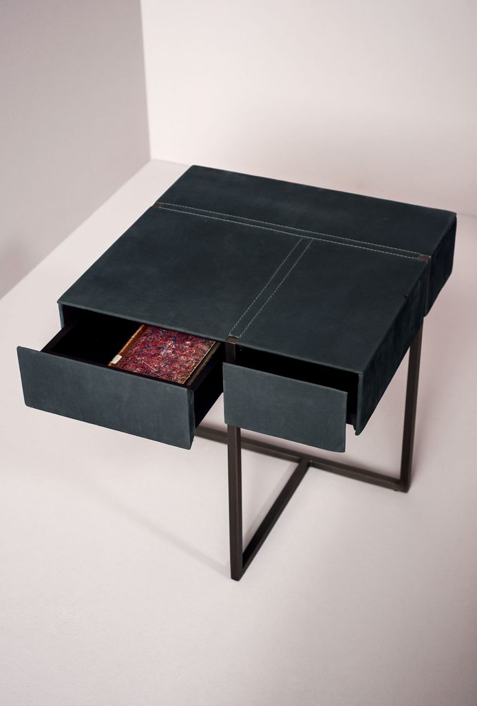Enhance your bedroom decor with the Amarena Leather-wrapped nightstand.