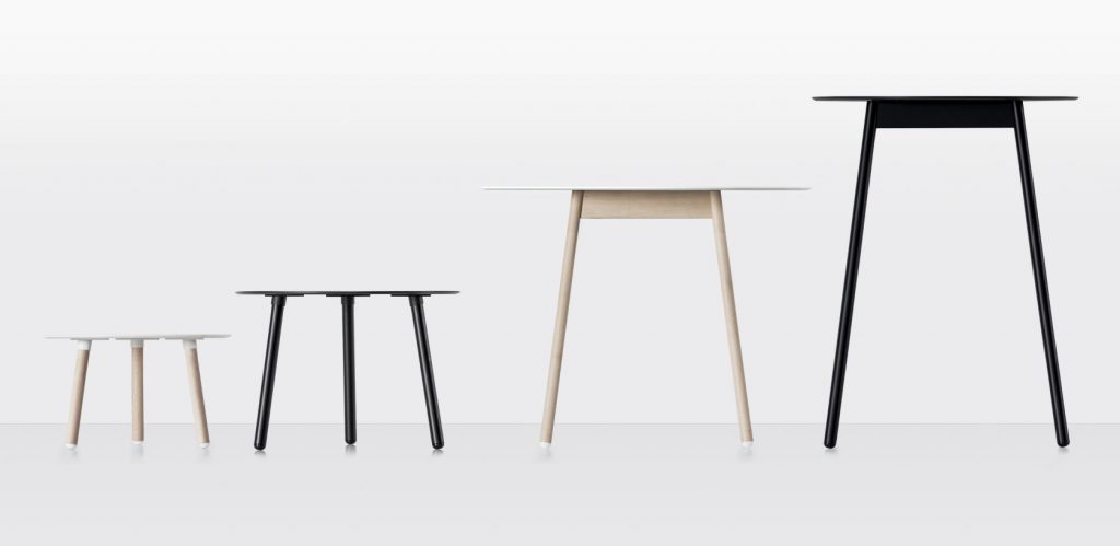 Four tables of different sizes made of wood throughout their structure in gray, black and white tones
