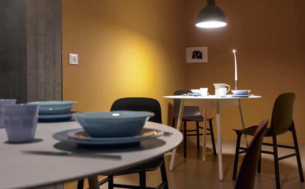 small dining table made of wood in its entire structure in a round shape in a white tone