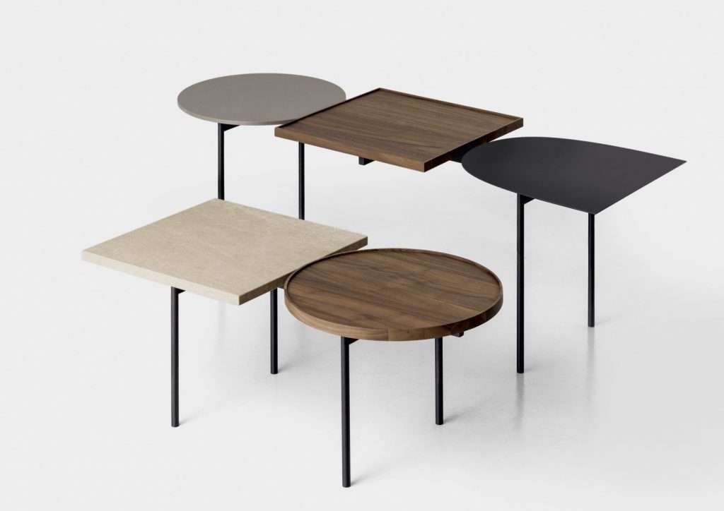 centerpiece made in geometric shapes on a metal base and wooden tops of different colors