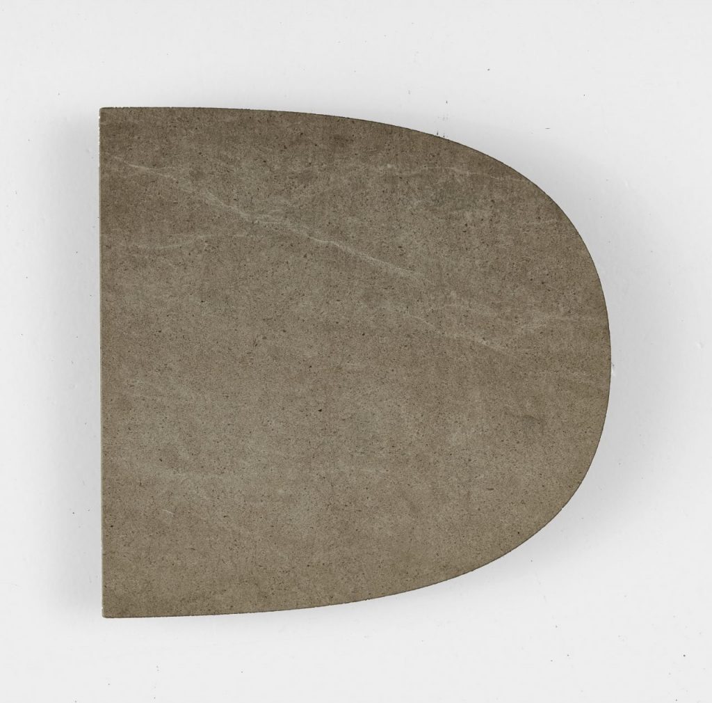 gray centerpiece made in the shape of an oval on a wooden base on a white background