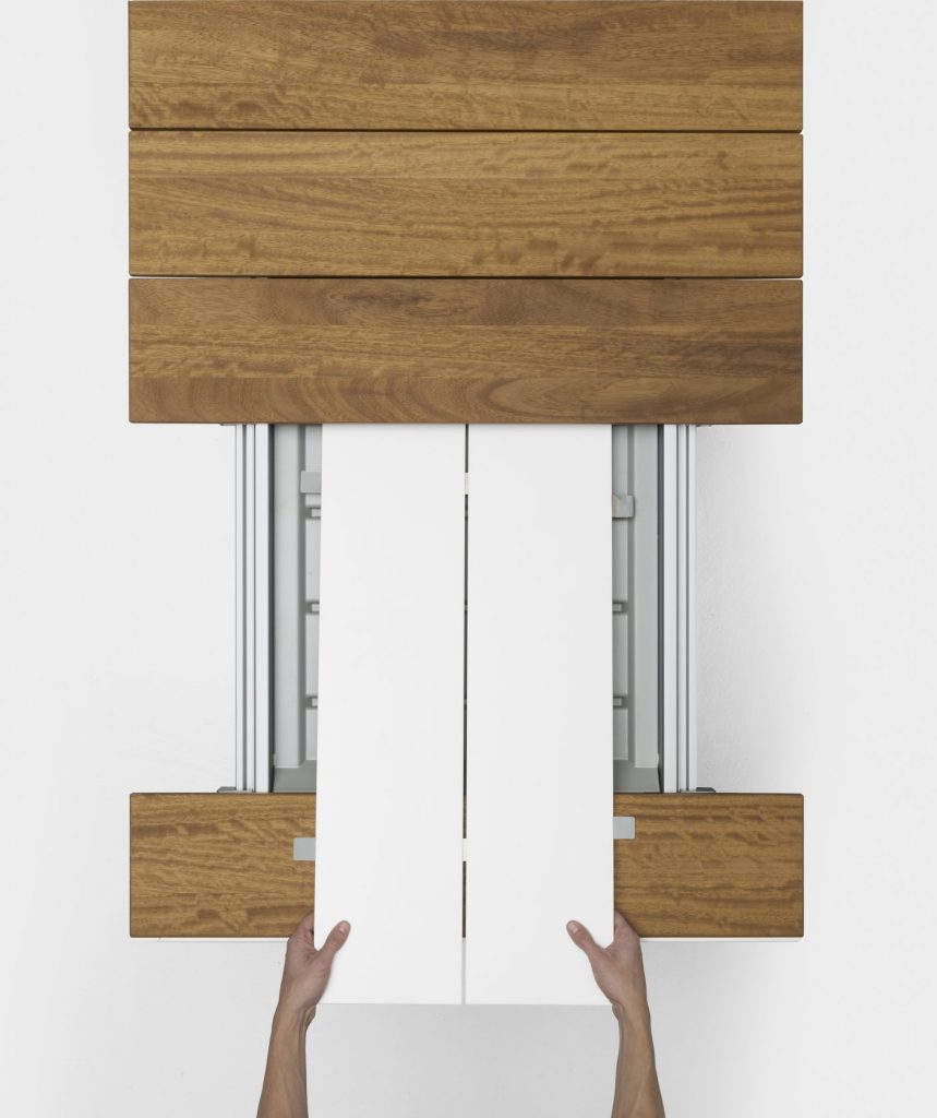 extendable table made of metal and aluminum in a white and coffe tone on a white background