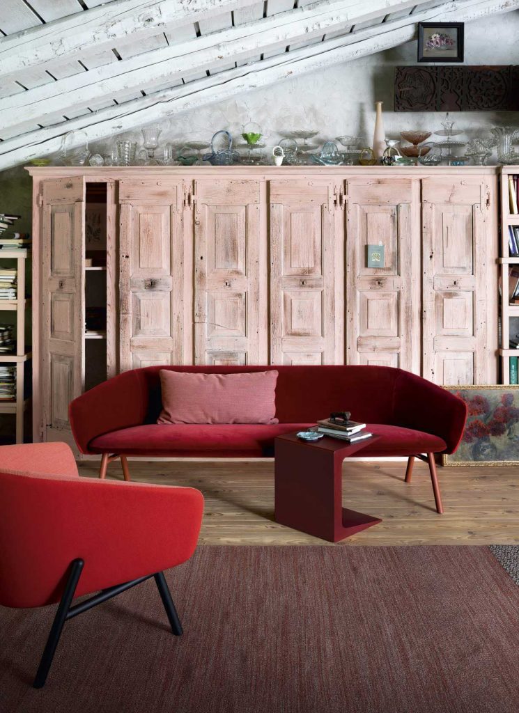 armchair made of fabric and polyurethane foam in a red tone on the outside