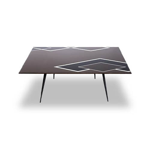 Coffee table featuring hand-decorated geometric design on black lacquered top a white background.
