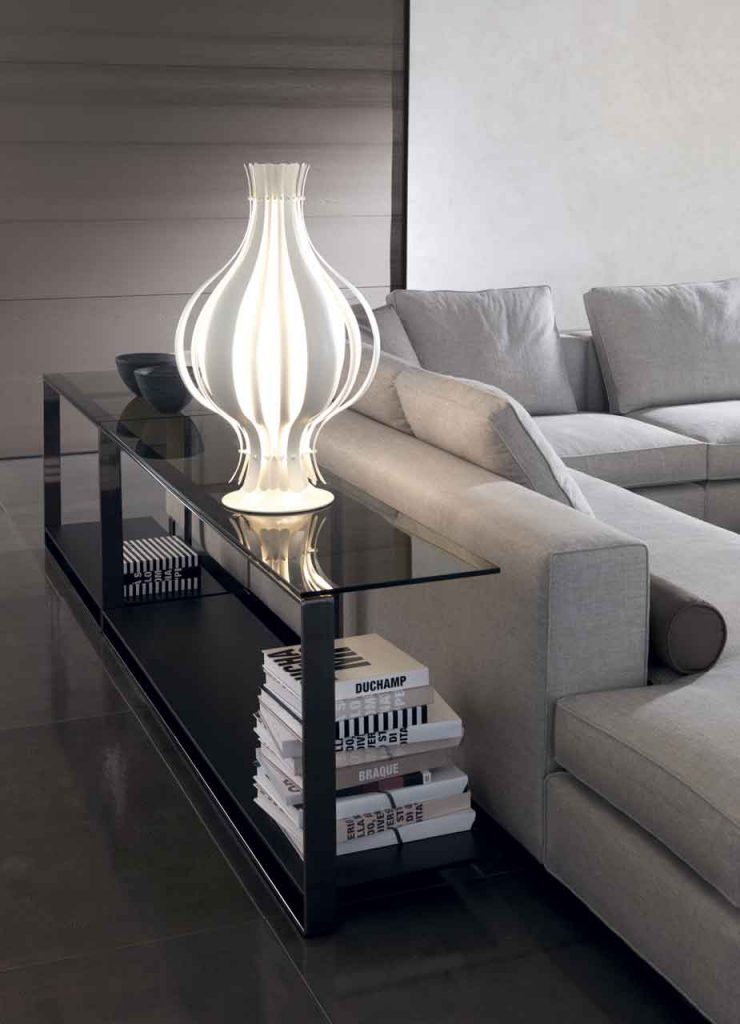 table lamp made with an opening in its design on a table in a room