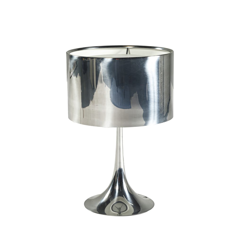 Small metal table lamp with polished aluminum finish on a white background