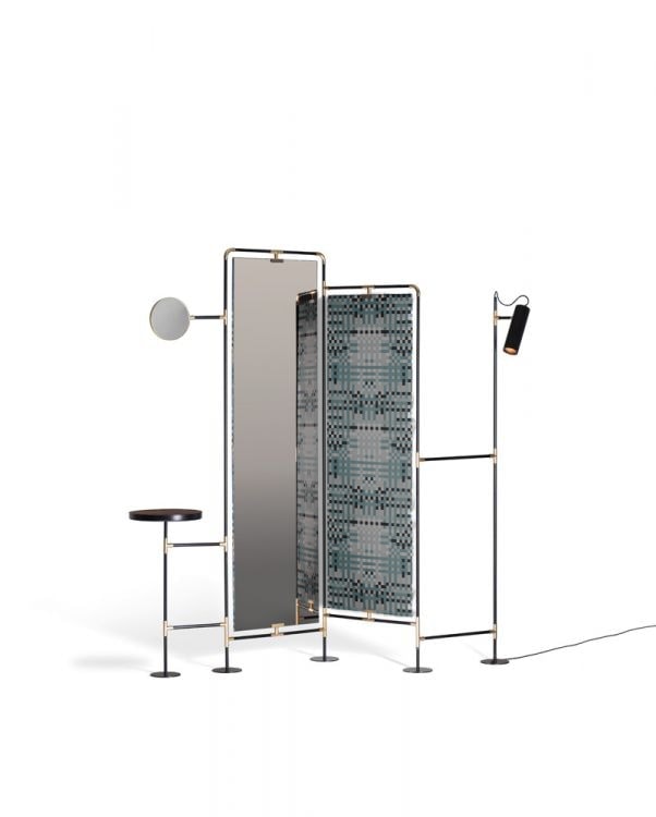 A lamp, a vanity mirror and a small marble table make up the set on a white background.