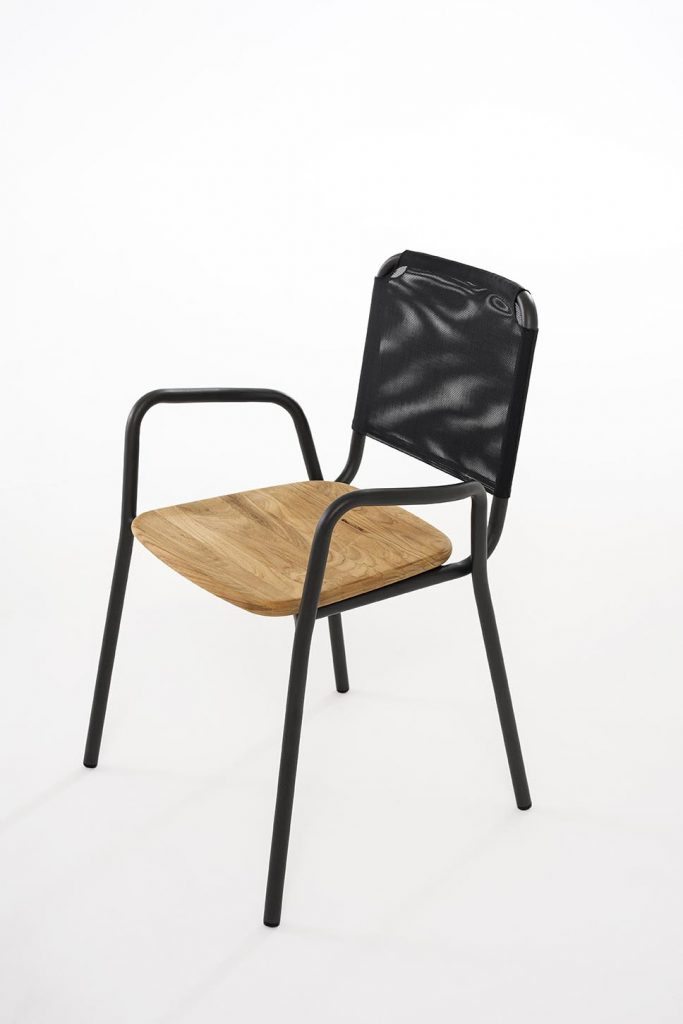 Guest One Armchair in black in front of a white background