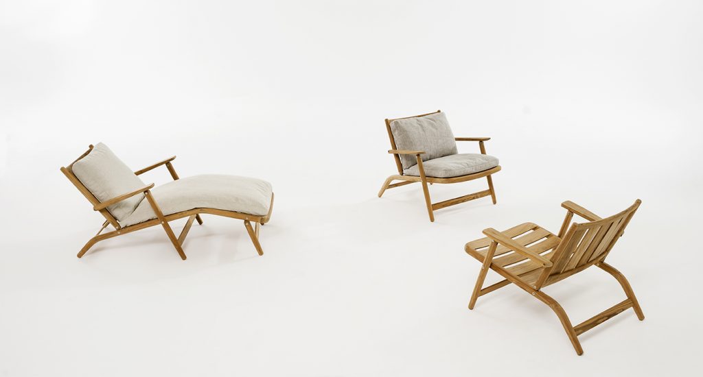 Three Levante Seven Lounge Chair facing each other in an all white room