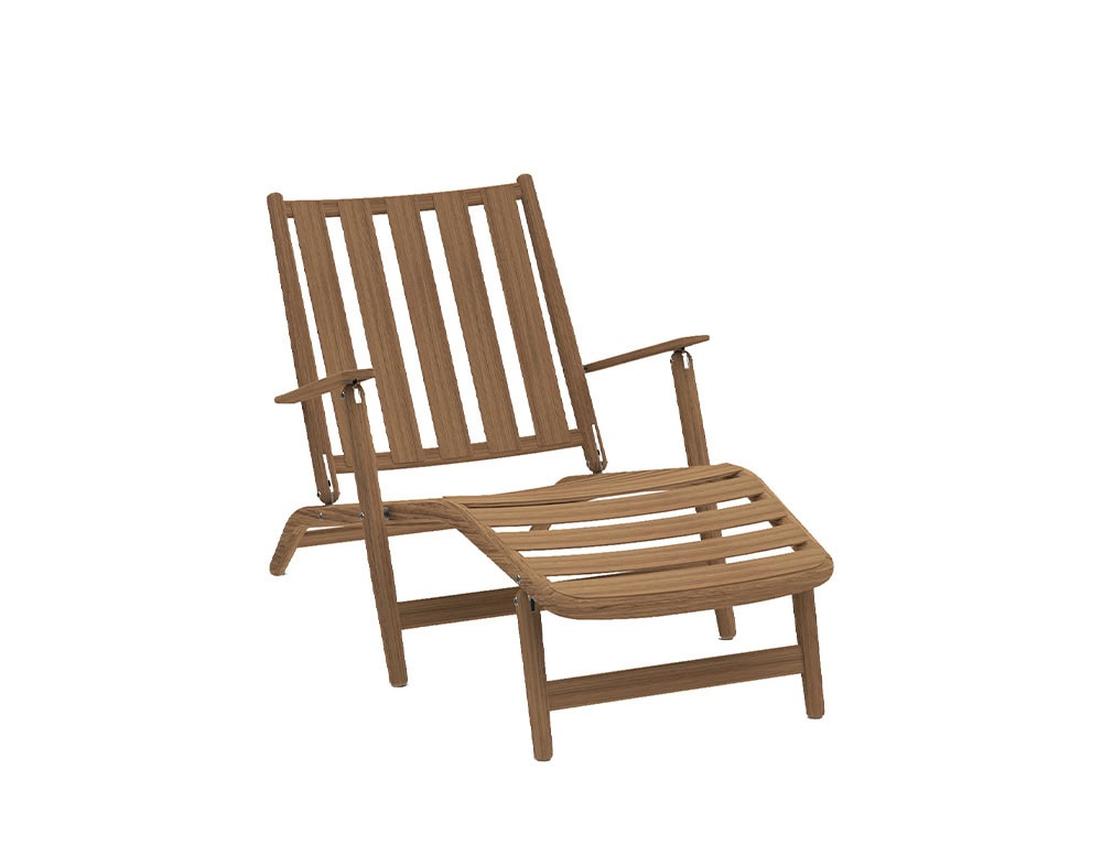 Rod Levante Lounge Chair combines a slatted teak frame with an integrated footrest, offering a relaxed, spacious seating experience for outdoor living.