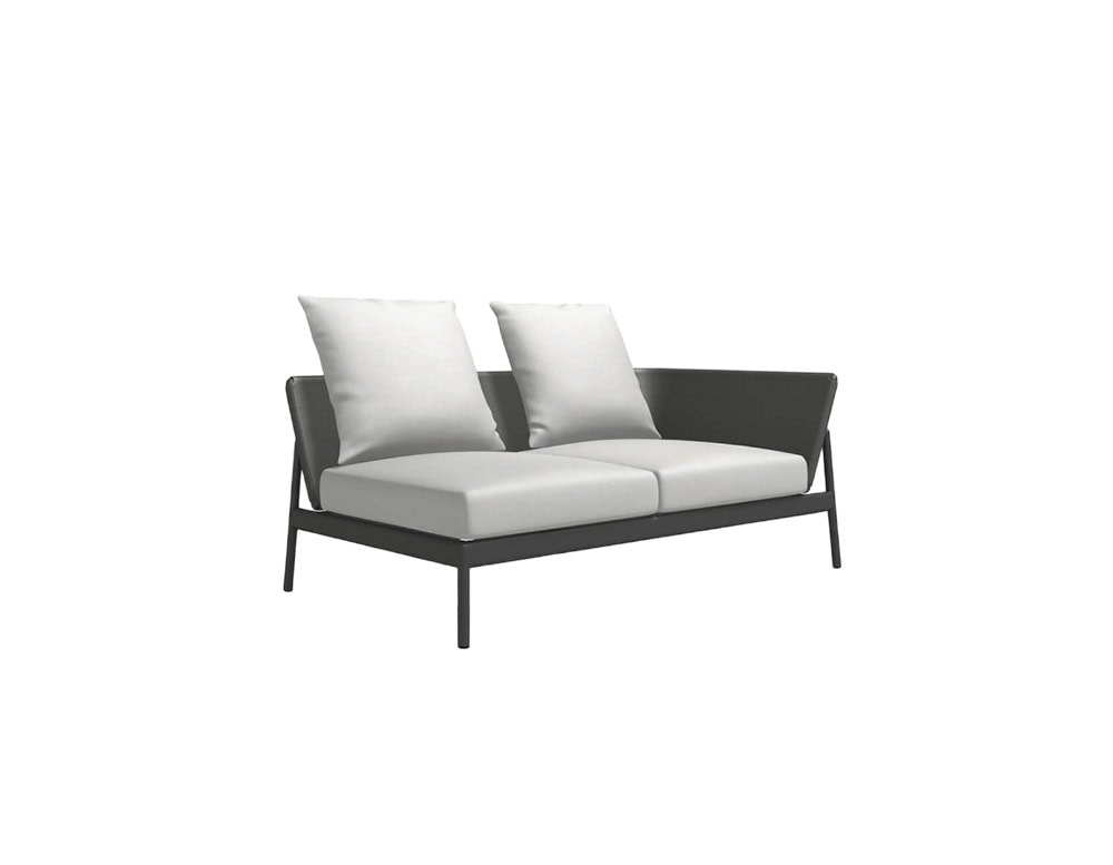 Rod Piper Sofa blends modern elegance with inviting cushions, offering a stylish and comfortable spot to unwind outdoors.