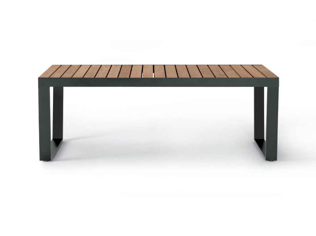 Spinnaker Thirty Four Extendable Table in a dark wood finish in the original position in front of a white background