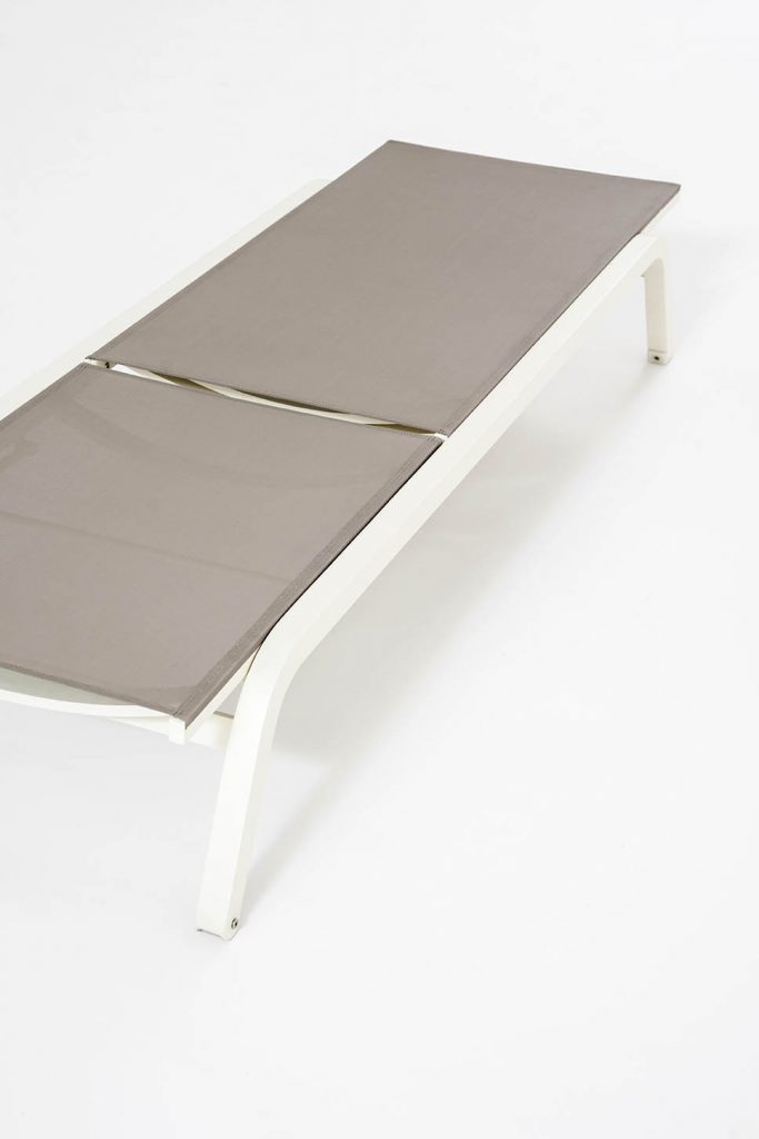 Surfer One Sunlounger in white variant laying flat on a white surface