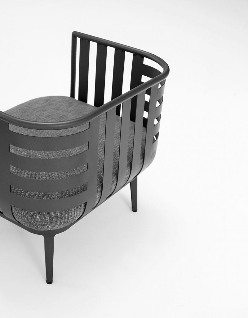 Back view of Thea One Sofa in a grey frame with a grey colored cushion