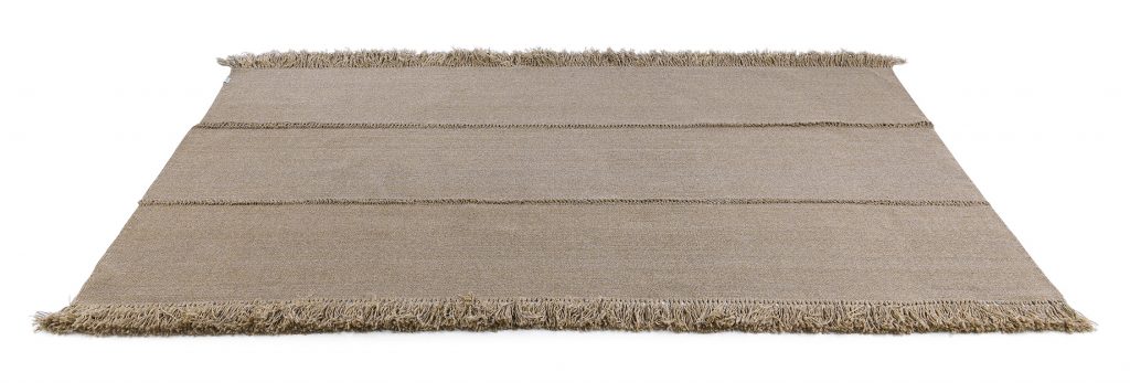 Triptyque One Rug in tan color in front of a white background