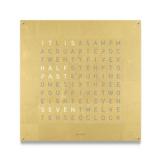 QLOCKTWO One Hundred Eighty in gold in front of a white background