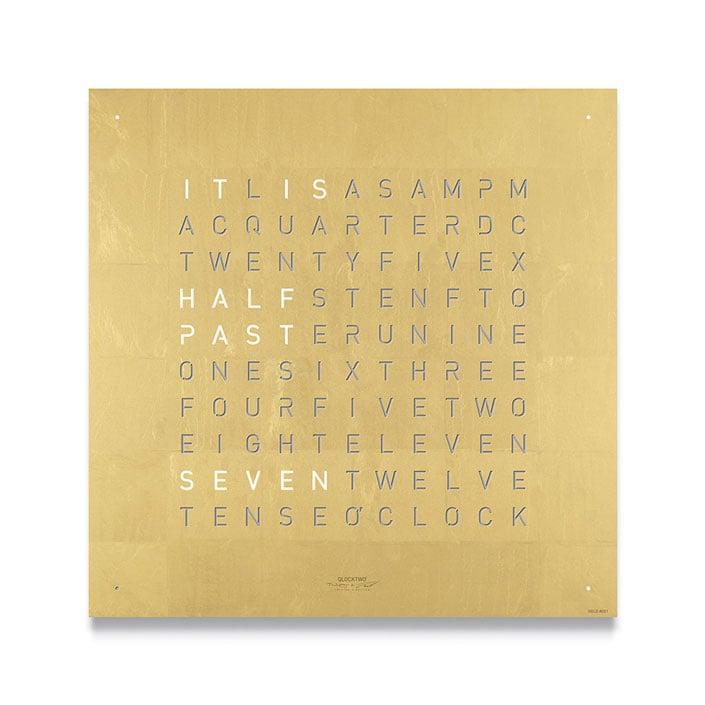QLOCKTWO Classic in gold in front of a white background
