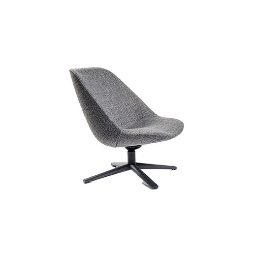 Angled view of Adele armchair in front of a white background