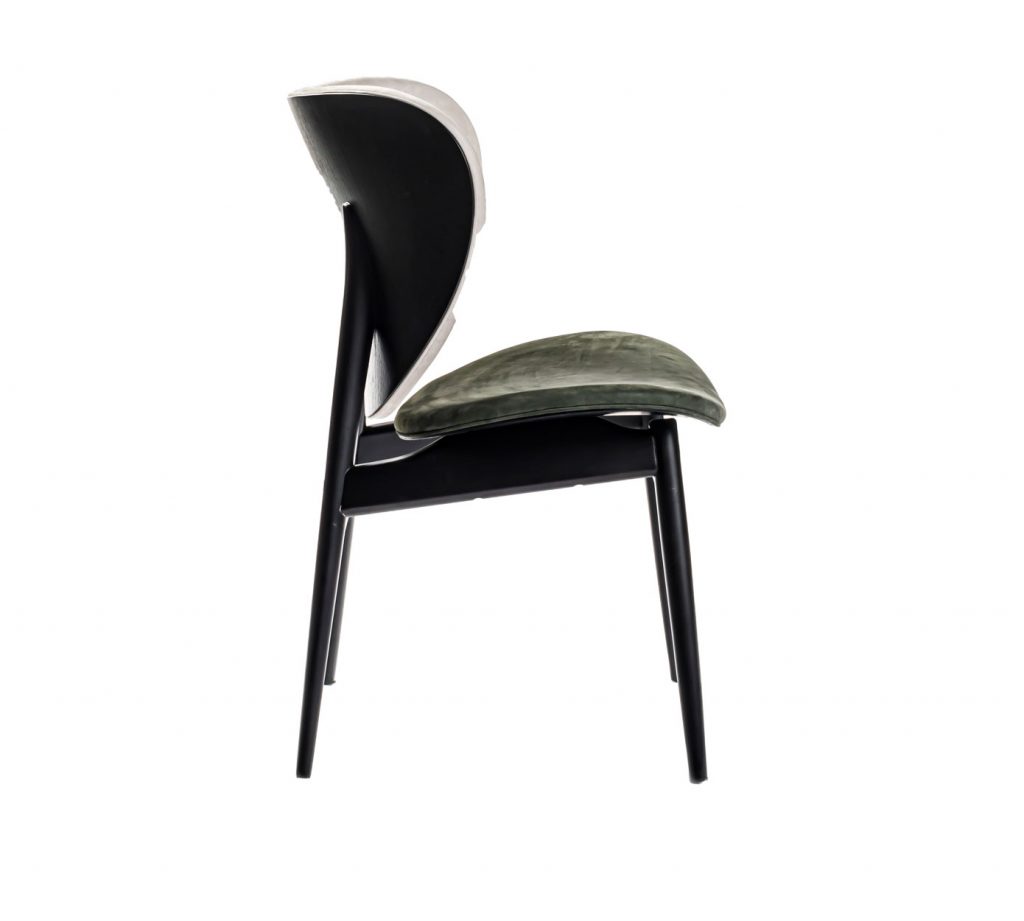 Side view of Alma Chair in front of a white background
