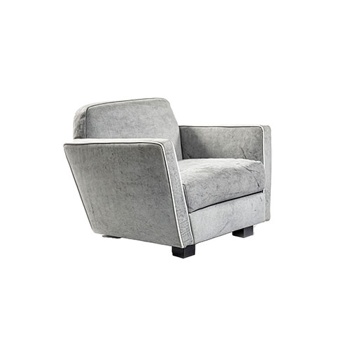 Angled view of Capri Armchair in front of a white background
