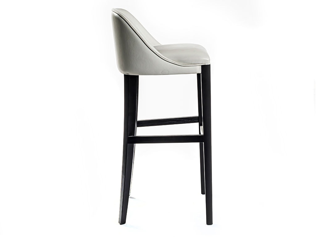Side view of Décor high barstool in front of a white background