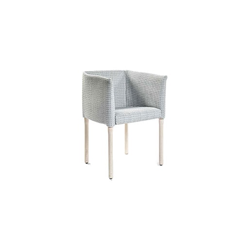 Angled view of Elsie dining chair in front of a white background