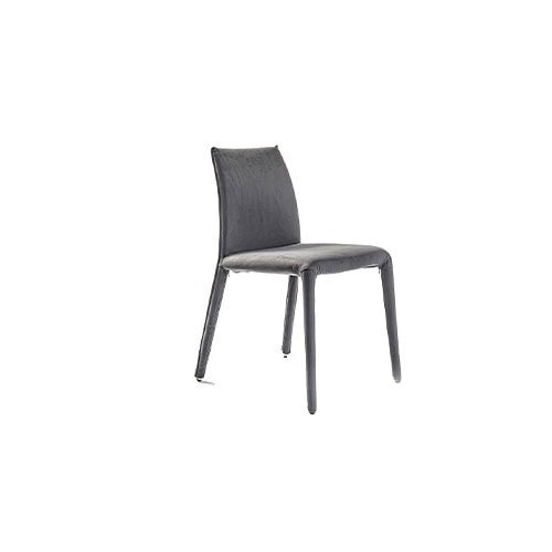 Angled view of Emi dining chair in front of a white background