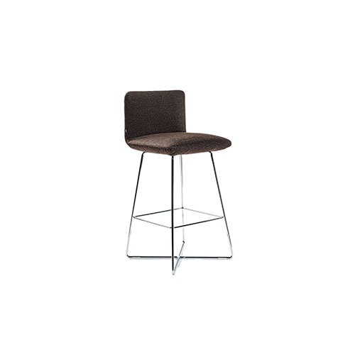 Angled view of Jalis barstool in front of a white background