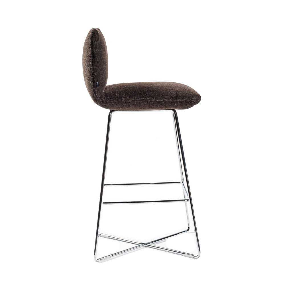 Side view of Jalis barstool in front of a white background