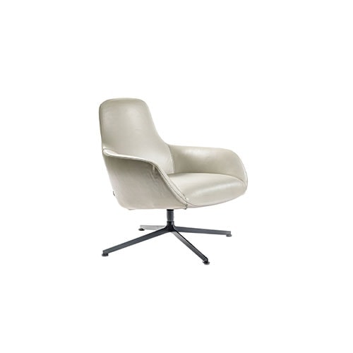 Angled view of Kent armchair in front of a white background