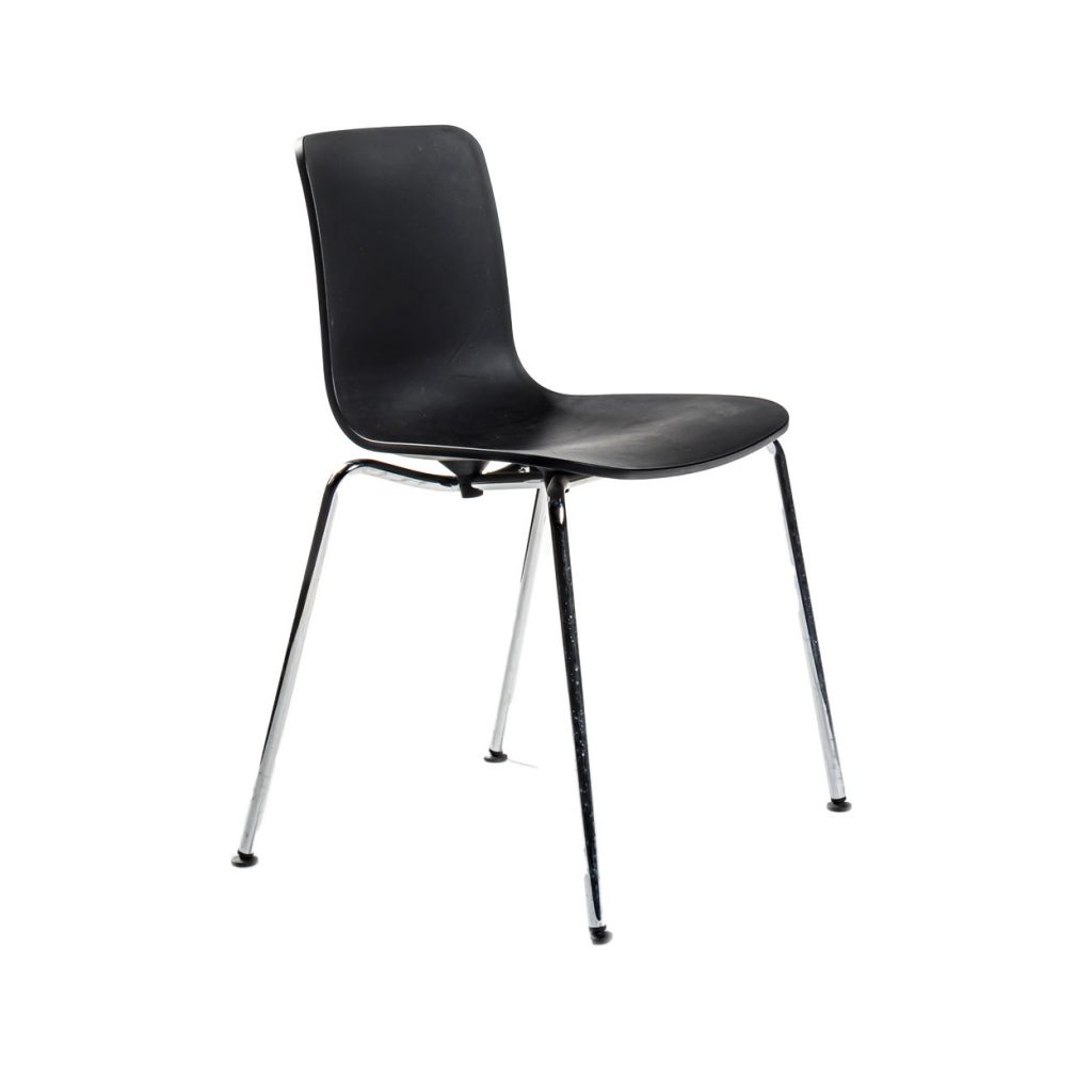 Angled view of Stack chair in front of a white background
