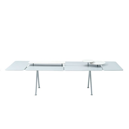 A sleek modern table with clean lines and adjustable trays adds versatility making it ideal for both dining and display.