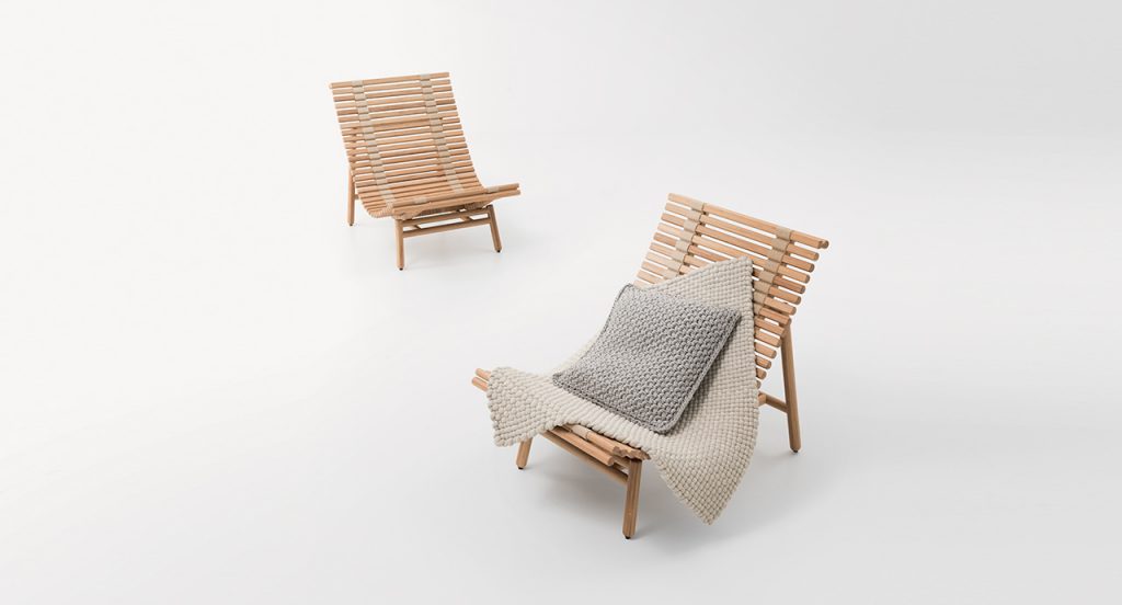 Pair of Shibui Armchair in front of a white background