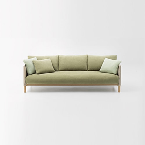 Vespucci Sofa in green in front of a white background