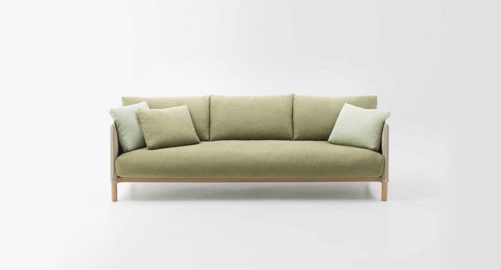Vespucci Sofa in green in front of a white background