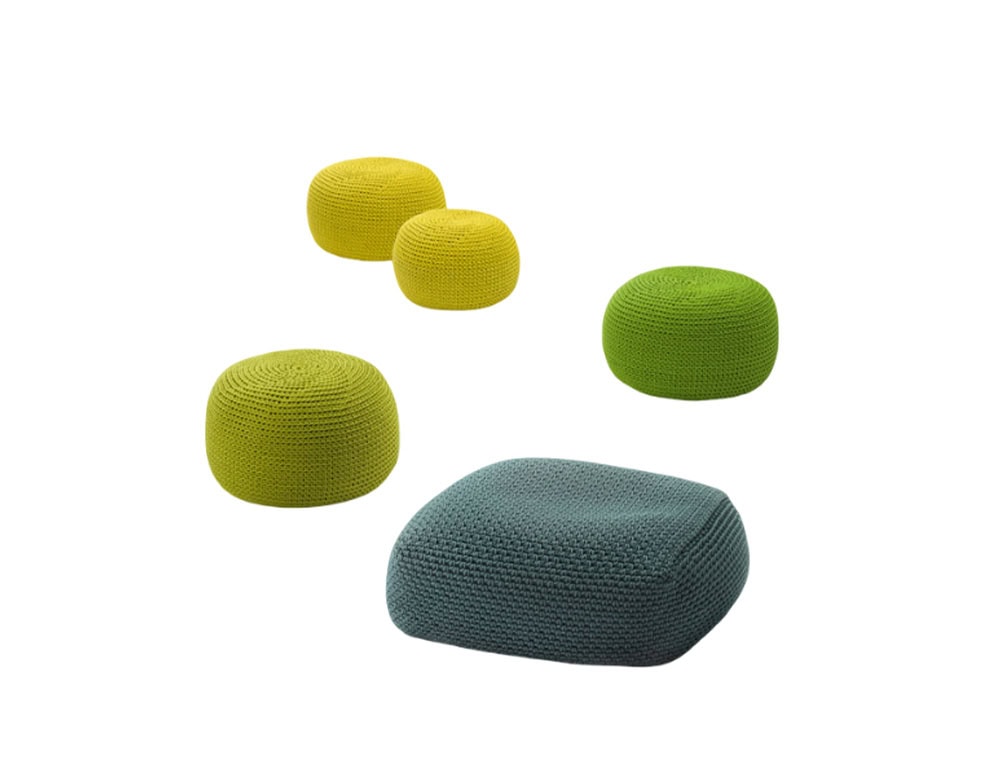 A playful set of poufs in bright green yellow and teal shades featuring a knitted texture that adds softness and versatility to indoor or outdoor spaces.