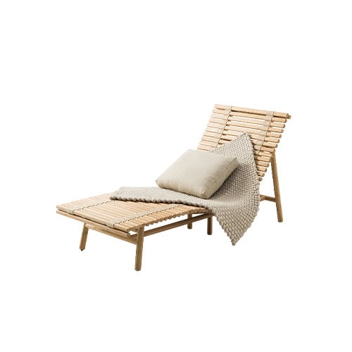 This lounge chair combines clean wood structure with cozy textile accents offering comfort and elegance for outdoor or indoor spaces.