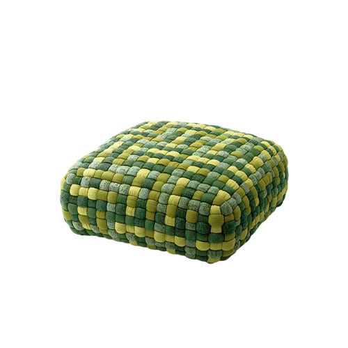 A square pouf with interlaced green and yellow strands creating a striking look that blends function with a touch of modern craft.