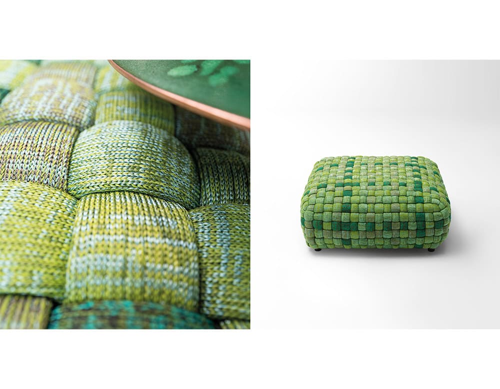 This woven pouf combines rich green tones and a soft, structured form, offering comfort and a striking accent for modern settings.