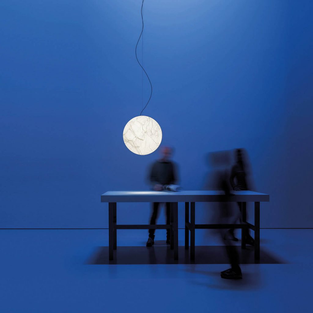 Small Moon light illuminating a blue room