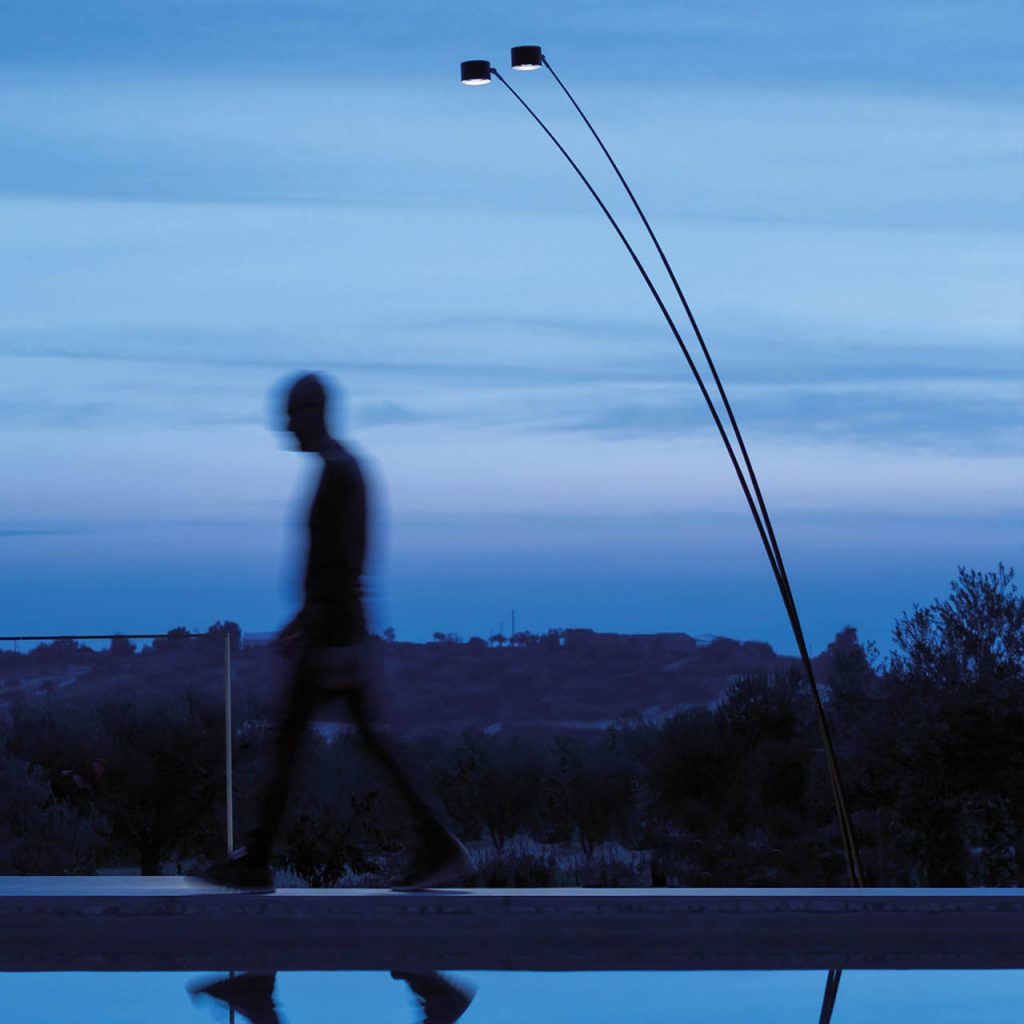 Sampei Outdoor during the evening with a person walking in front